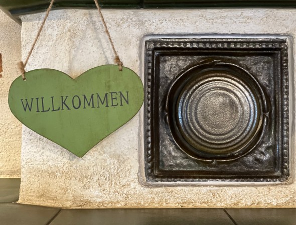 Warming tiled stove with loving details