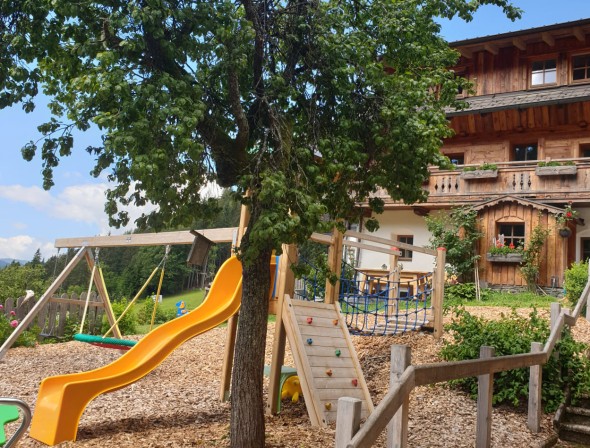 Children's playground directly at the farm